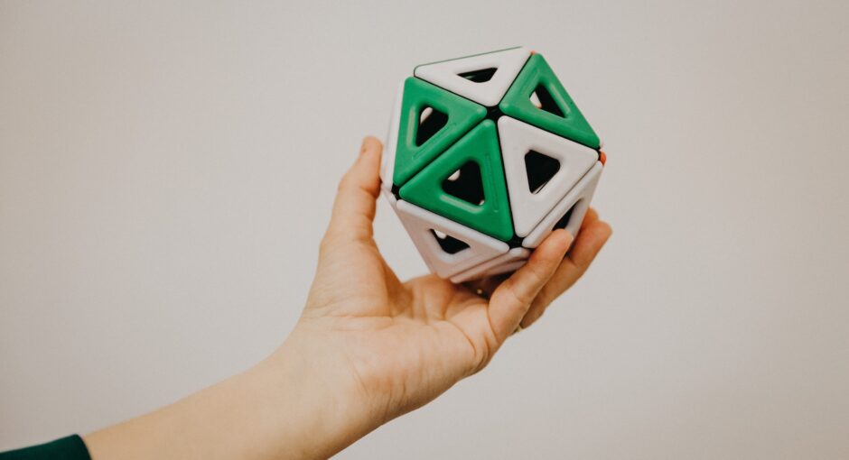 person holding cube printed on 3d printer